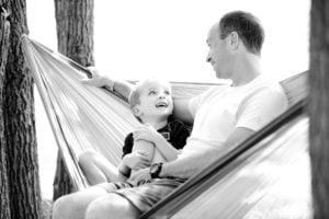 Father and son talking about AIG American General Life Insurance