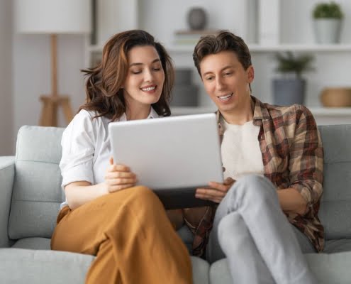 two people learning about life insurance dividends