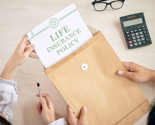 imputed income life insurance policy document in envelope