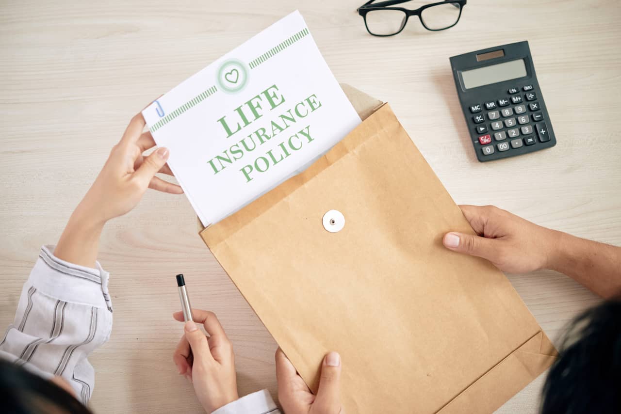 imputed income life insurance policy document in envelope