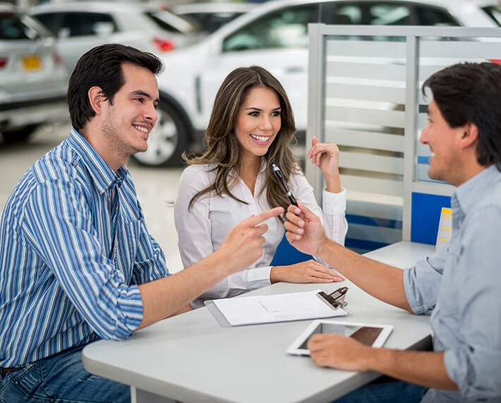 car dealer giving keys