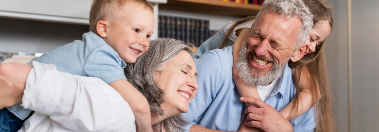 A couple with their children laughing