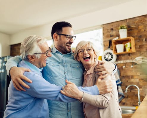 son with happy parents